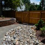 Retaining wall and landscaping installed by Bellus Terra