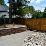 Retaining wall and landscaping installed by Bellus Terra
