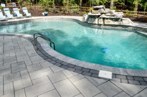 Paver pool deck installed in Wake Forest NC by Bellus Terra