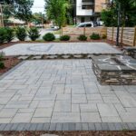 Raleigh outdoor living patio fire pit and basketball court